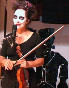 Kitty McIntyre, bluegrass fiddle, as White Faced ghoul