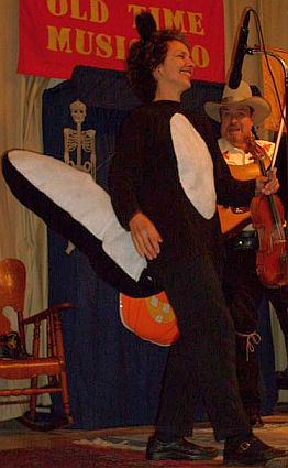Kitty McIntyre, bluegrass fiddler, in Polecat costume