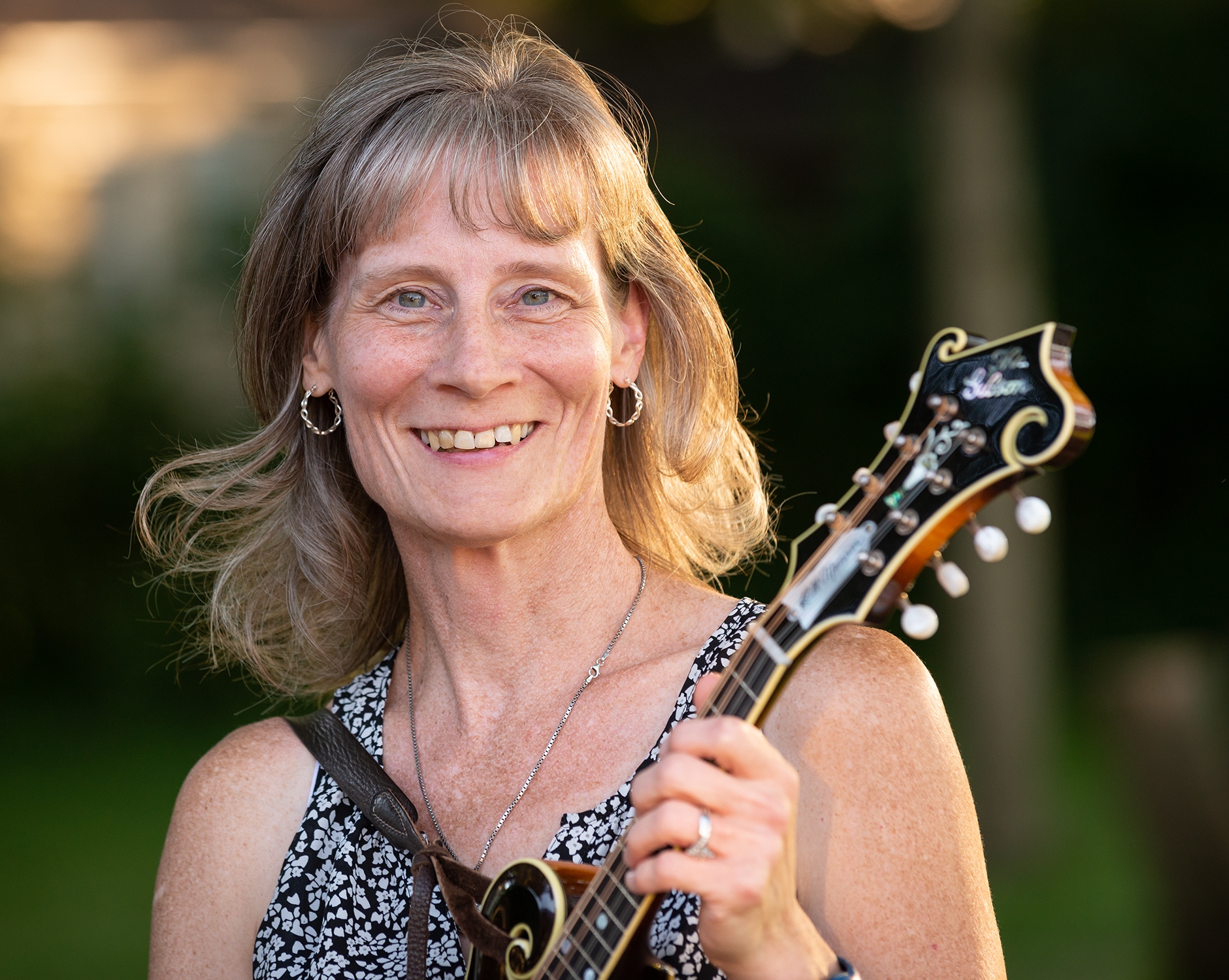 Susan Shook playing with Vernon McIntyre's Appalachian Grass in 2018.