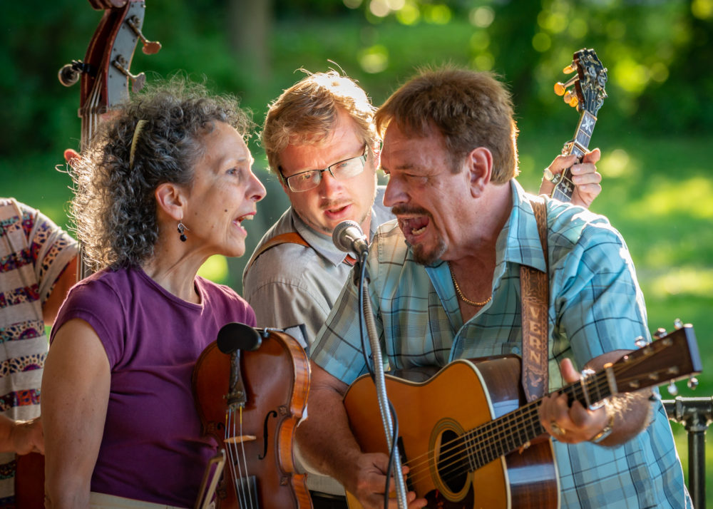 left to right Kitty McIntyre, Robert Campbell, and Vernon McIntyre singing a trio