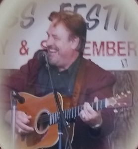 picture of Vernon McIntyre with his band Appalachian Grass at Rynearson Farm Festival in Westfield, IN